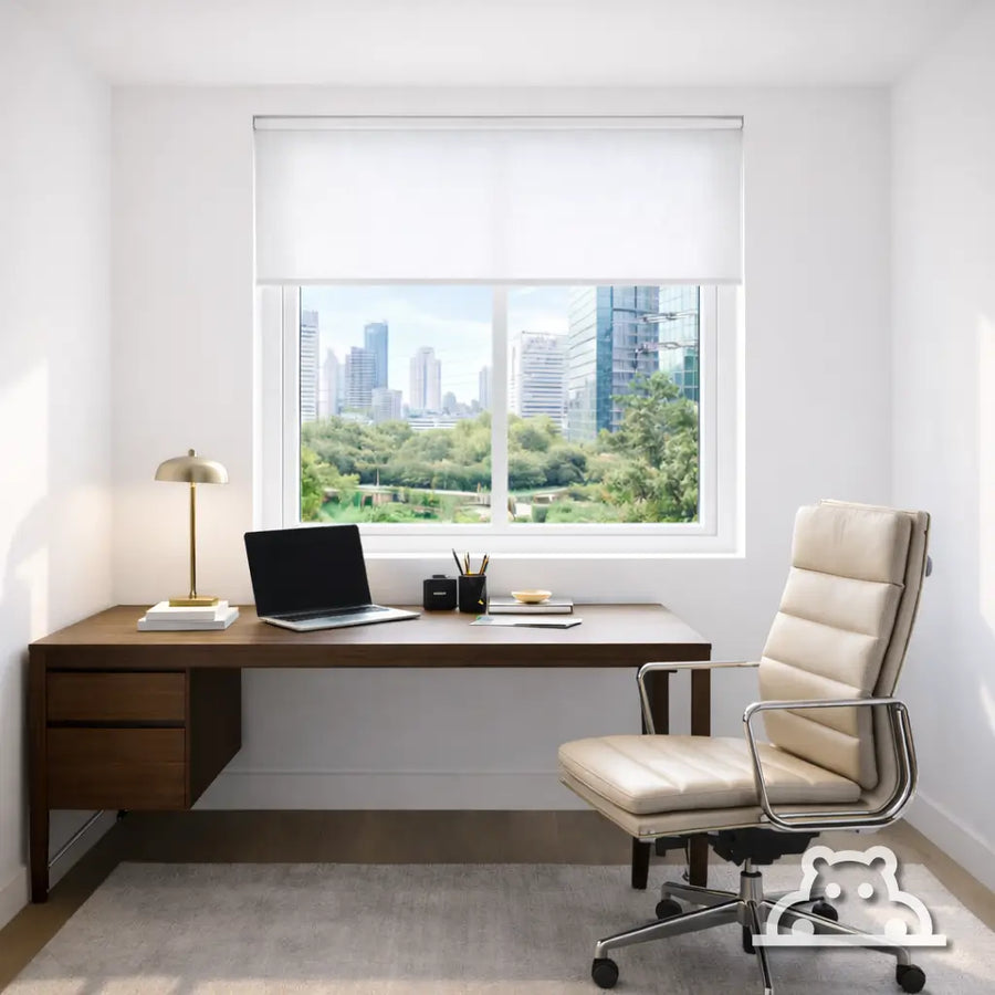 Modern home office with a white light-filtering roller shade partially open, revealing a bright city skyline view and a wooden desk with an Eames-style chair.