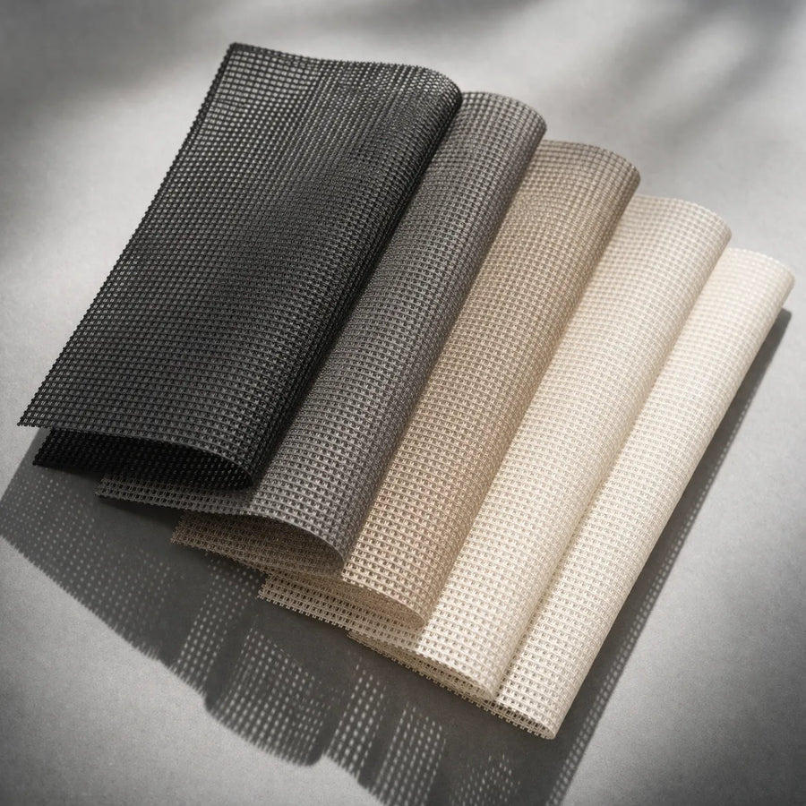 Roller shades sunscreen fabric swatches with breathable mesh texture allowing natural light and visibility